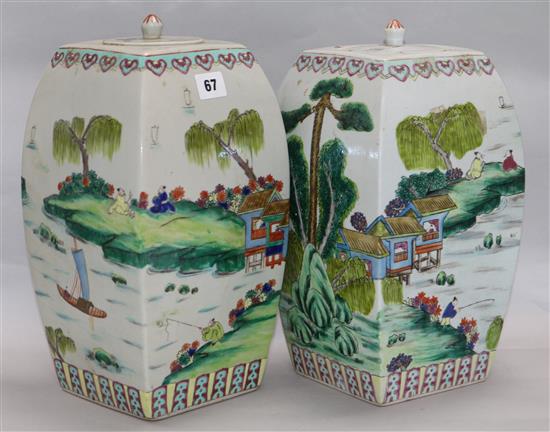 A pair of Chinese famille vert vases and covers height 35cm